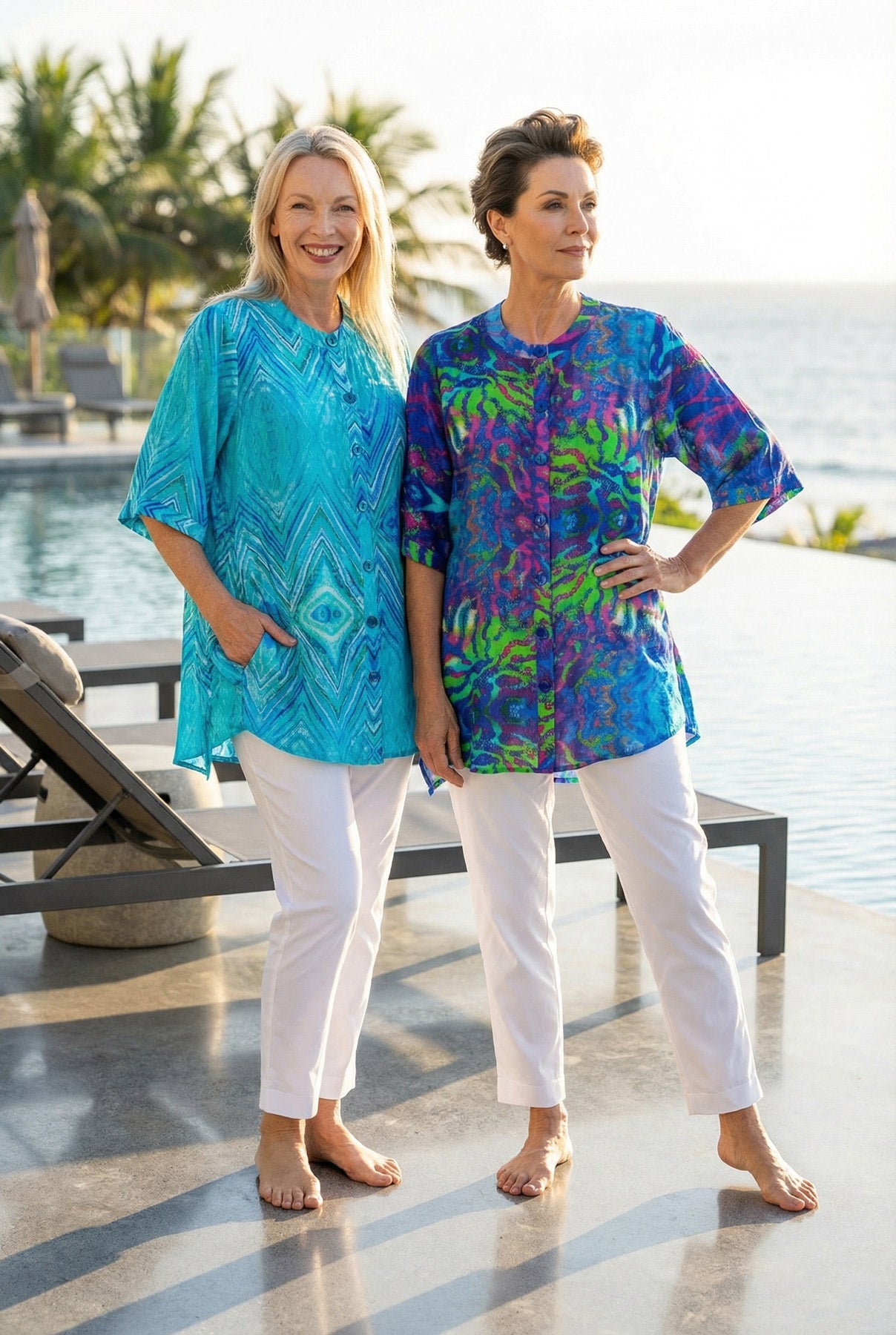 Woman wearing a colorful floral button-up blouse by Claire Powell, eco-friendly women's clothing