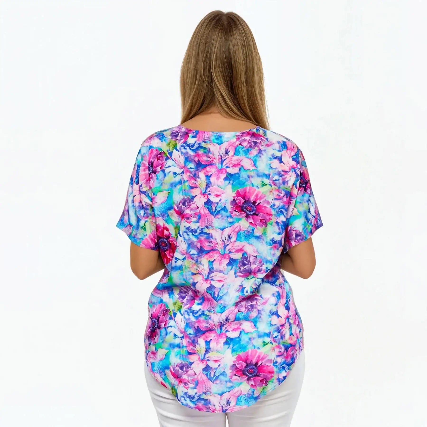 Claire Powell women’s floral print t-shirt in vibrant colors, eco-friendly fashion, back view
