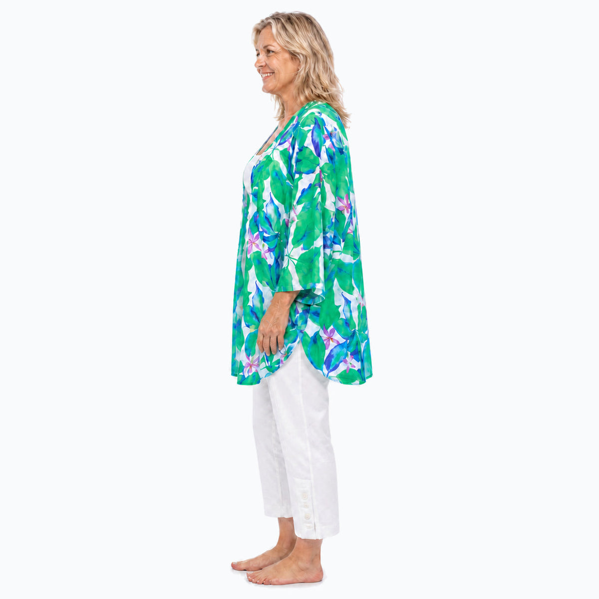 Claire Powell Broome Modal Kimono Cover-Up with matched green and cobalt print density, Model B in white capri pants, barefoot side view