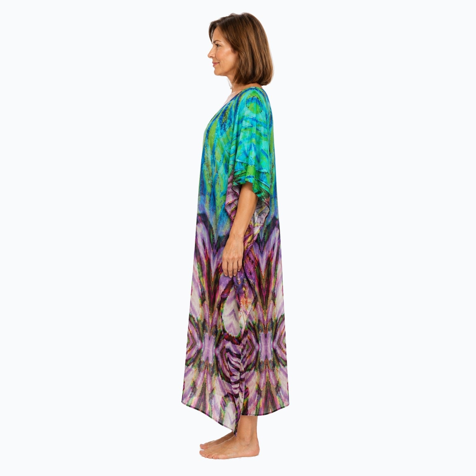 Claire Powell Cascade midi kaftan dress on a mature woman, side view
