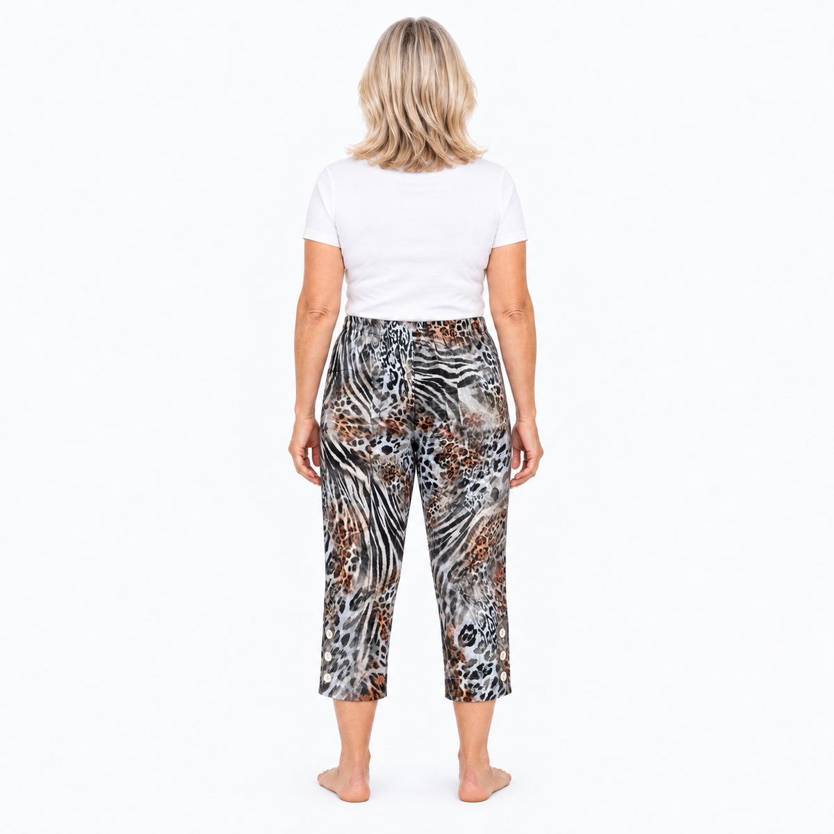 Woman wearing Claire Powell Jungle capri pants, back view
