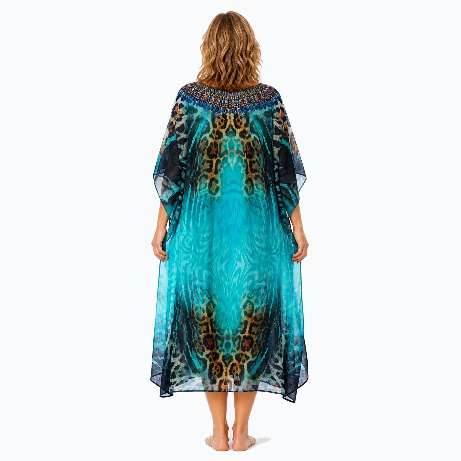 Claire Powell Jungle midi kaftan dress on a mature woman, back view