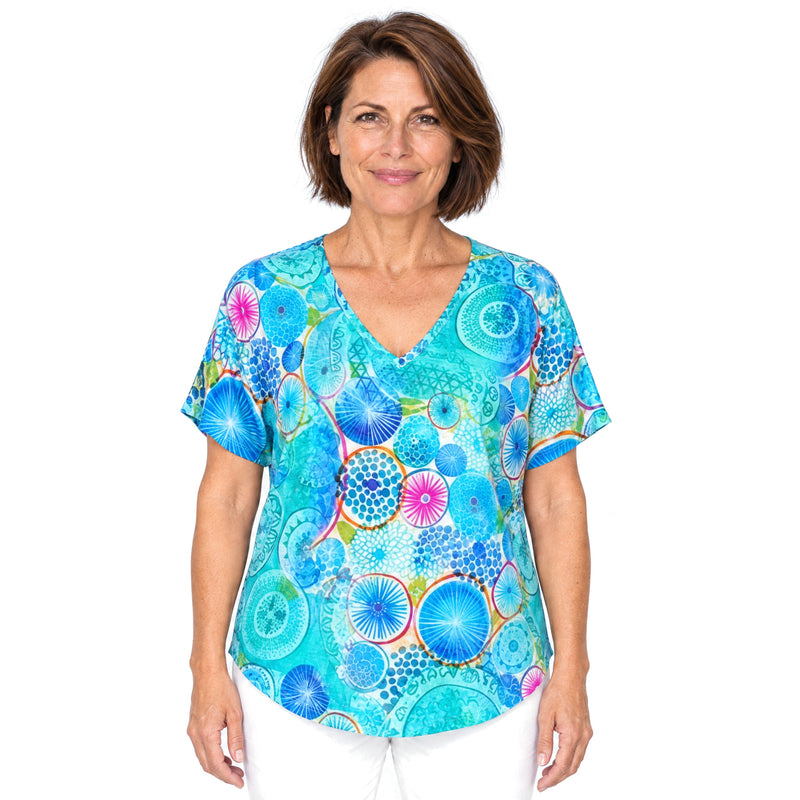 Woman wearing the Claire Powell Kaleido V-Neck T-Shirt, front view