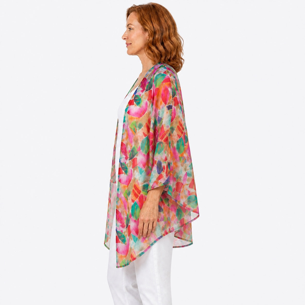 Woman wearing the Claire Powell La Peach Cotton Chiffon Kimono Cover-Up, side view