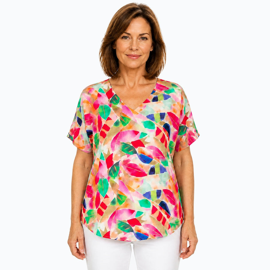 Woman wearing the Claire Powell La Peach V-Neck T-Shirt, front view
