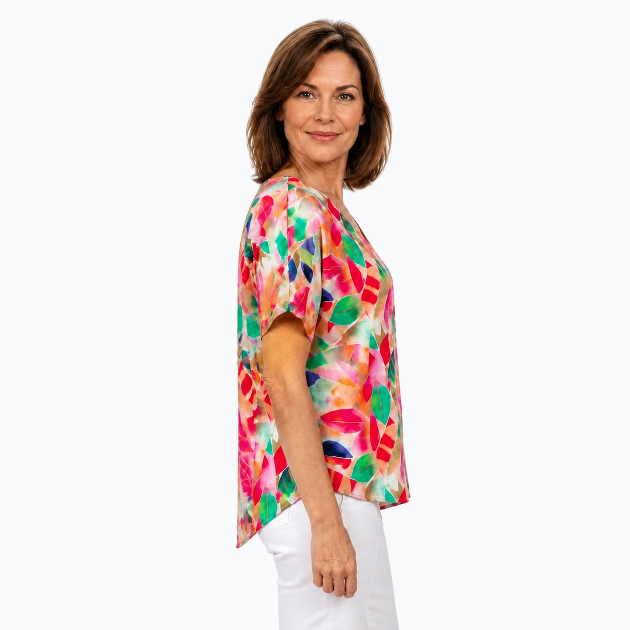 Woman wearing the Claire Powell La Peach V-Neck T-Shirt, side view