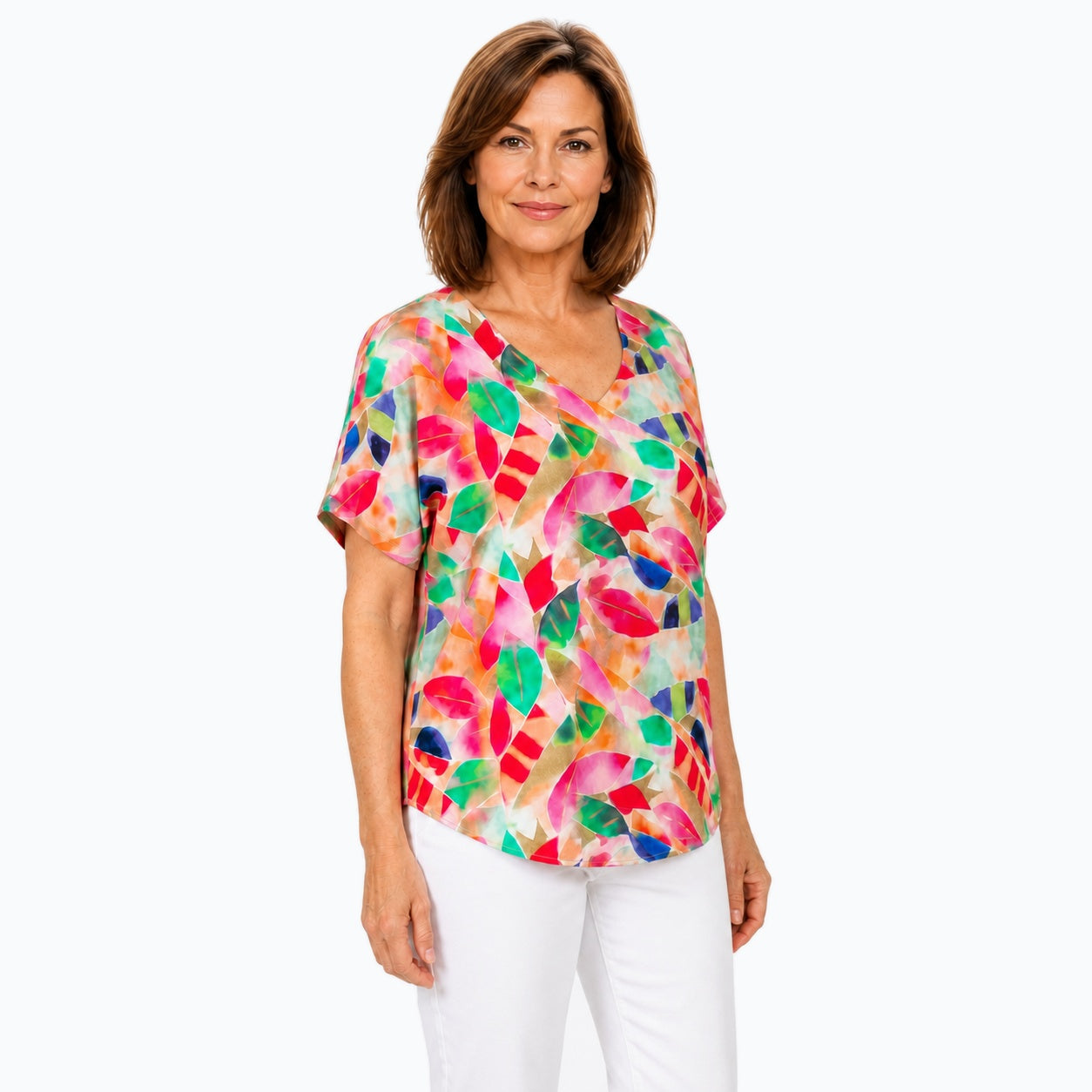 Woman wearing the Claire Powell La Peach V-Neck T-Shirt, three-quarter view