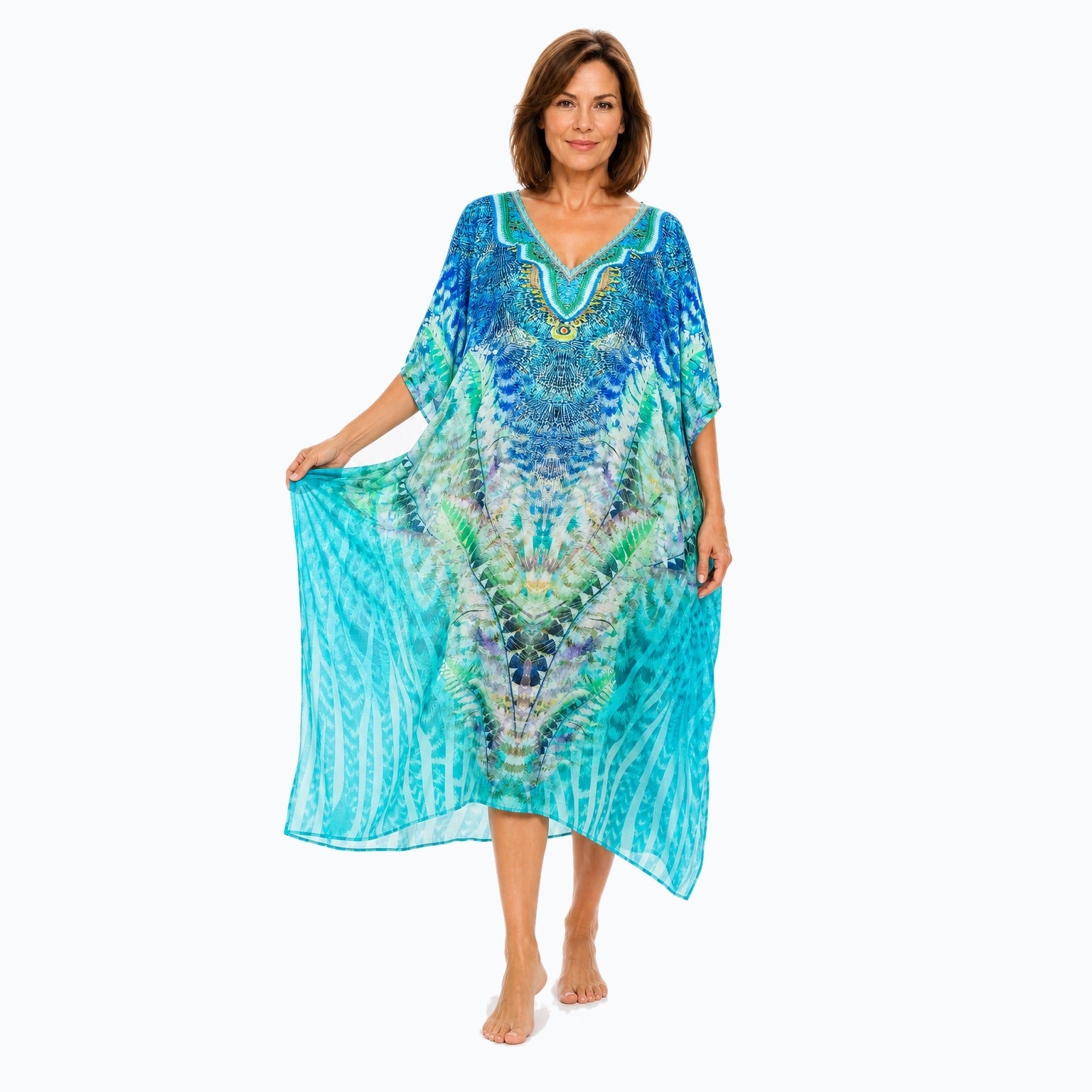 Claire Powell Marine midi kaftan dress on a mature woman, fabric-showing pose