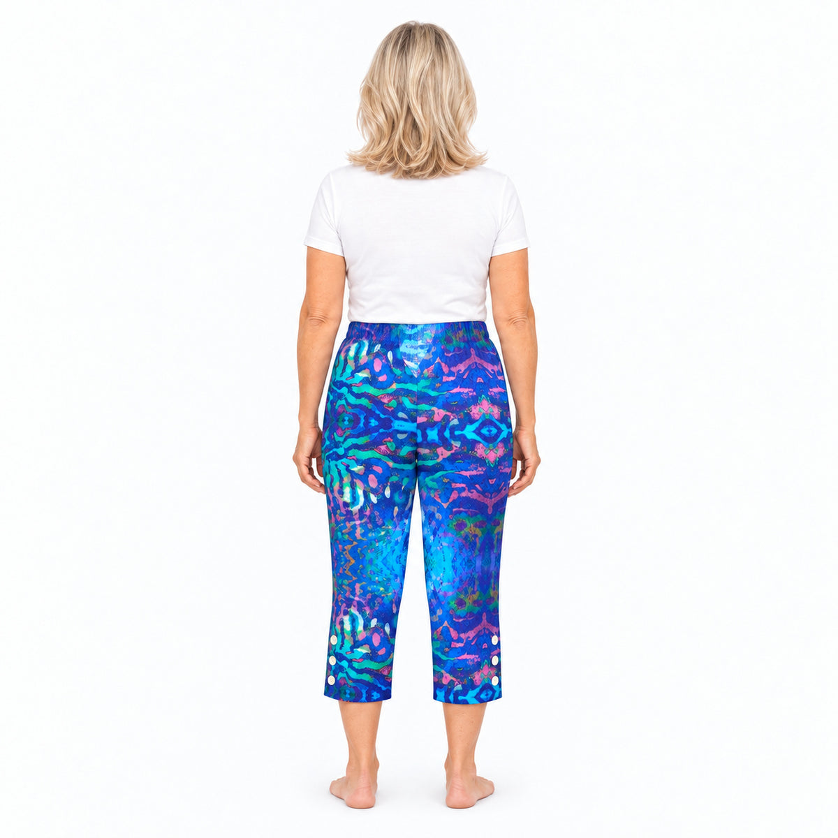 Woman wearing Claire Powell Mirage capri pants, back view