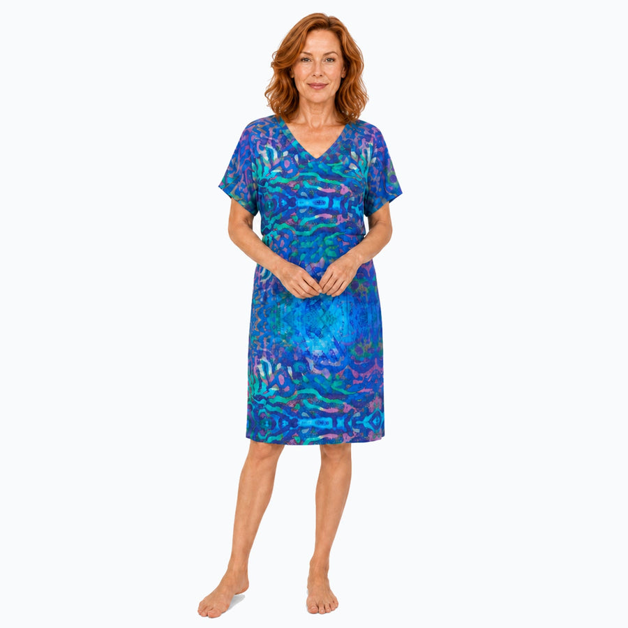 Woman wearing the Claire Powell Mirage Shift Dress, front view