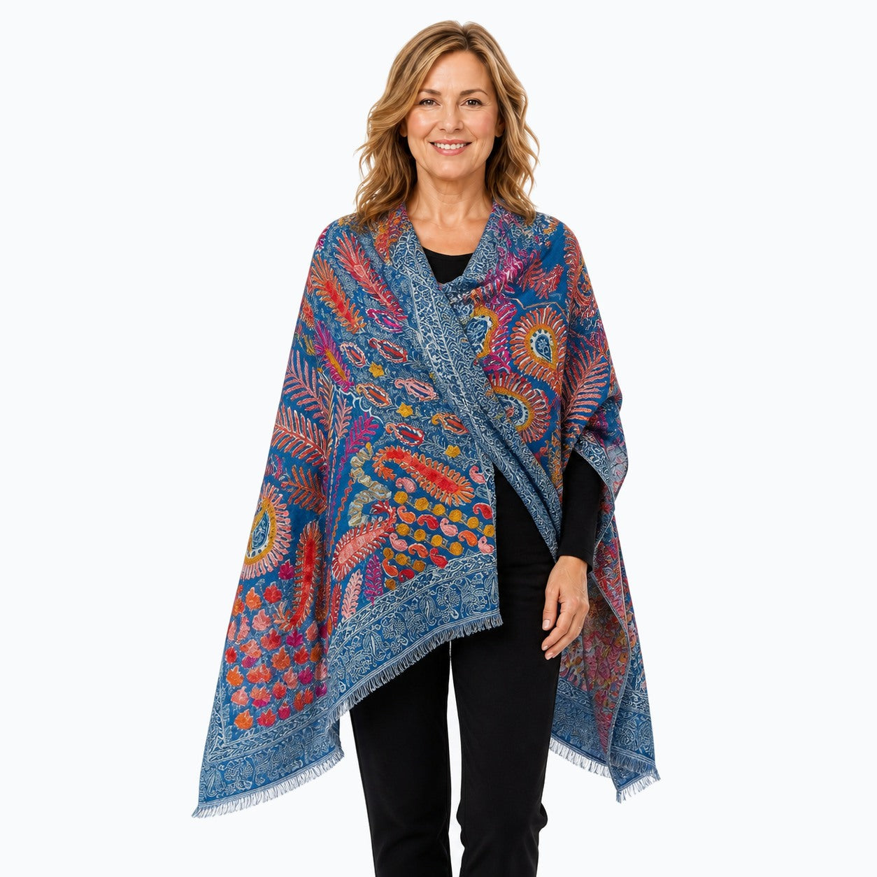Woman wearing the Claire Powell Ocean Wool Shawl, three-quarter view