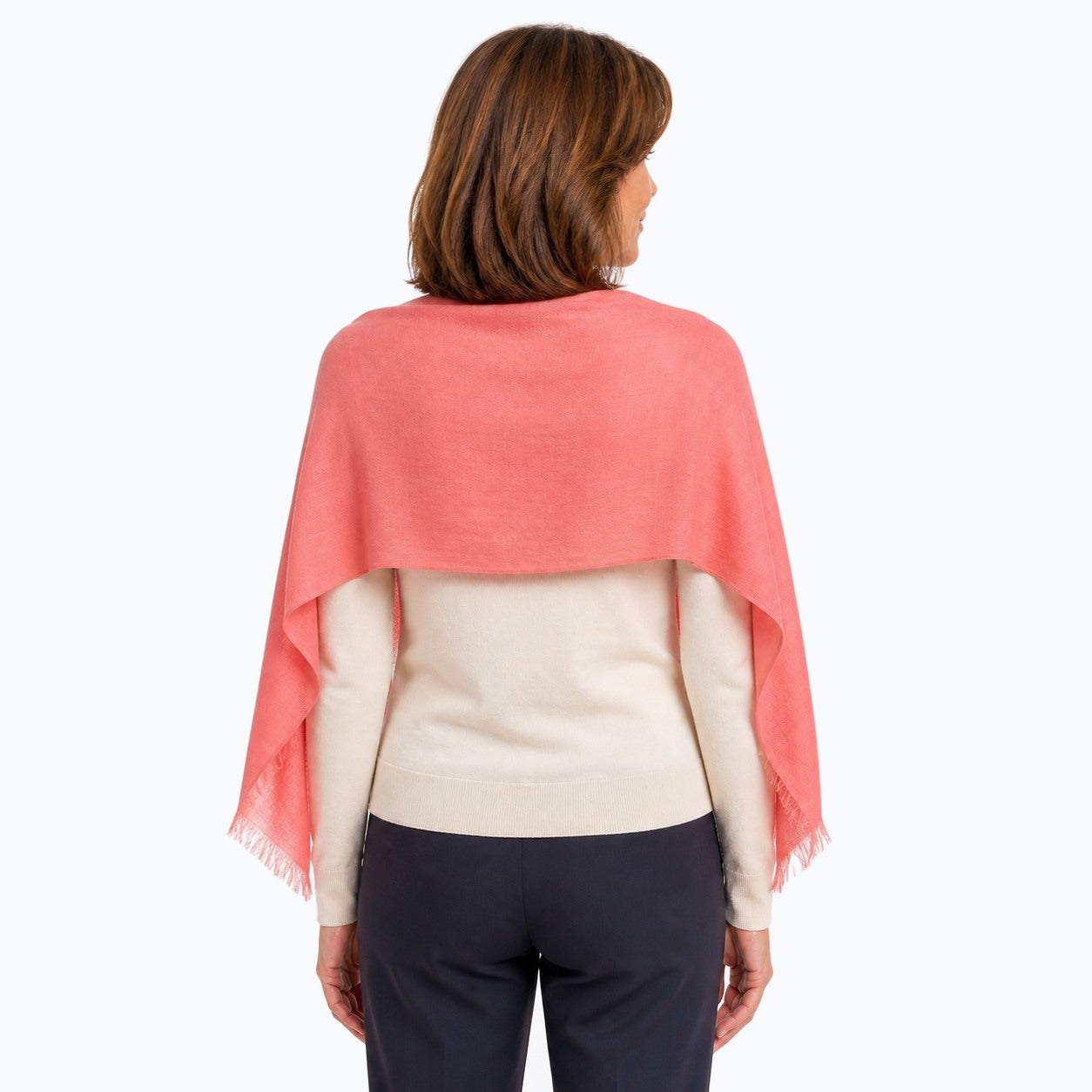 Woman wearing the Claire Powell Peach Silk Wool Scarf, back view