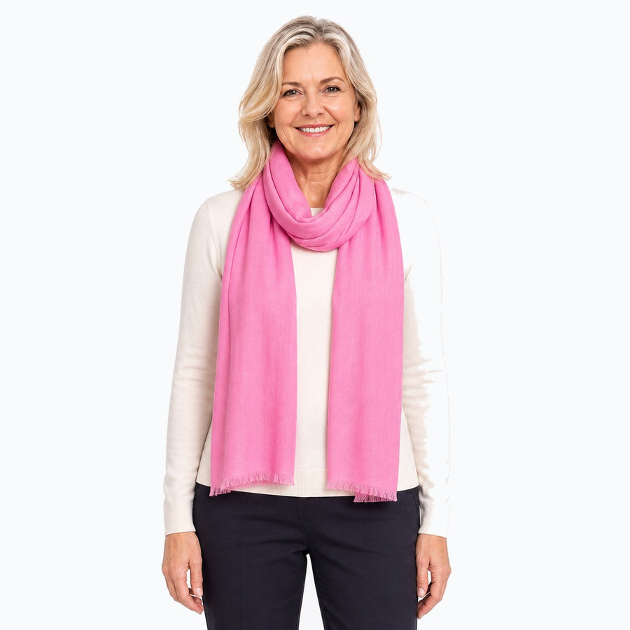 Woman wearing the Claire Powell Pink Silk Wool Scarf, front view