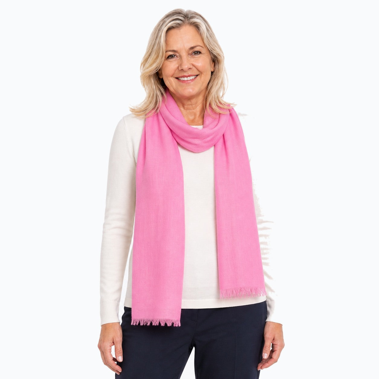 Woman wearing the Claire Powell Pink Silk Wool Scarf, three-quarter view