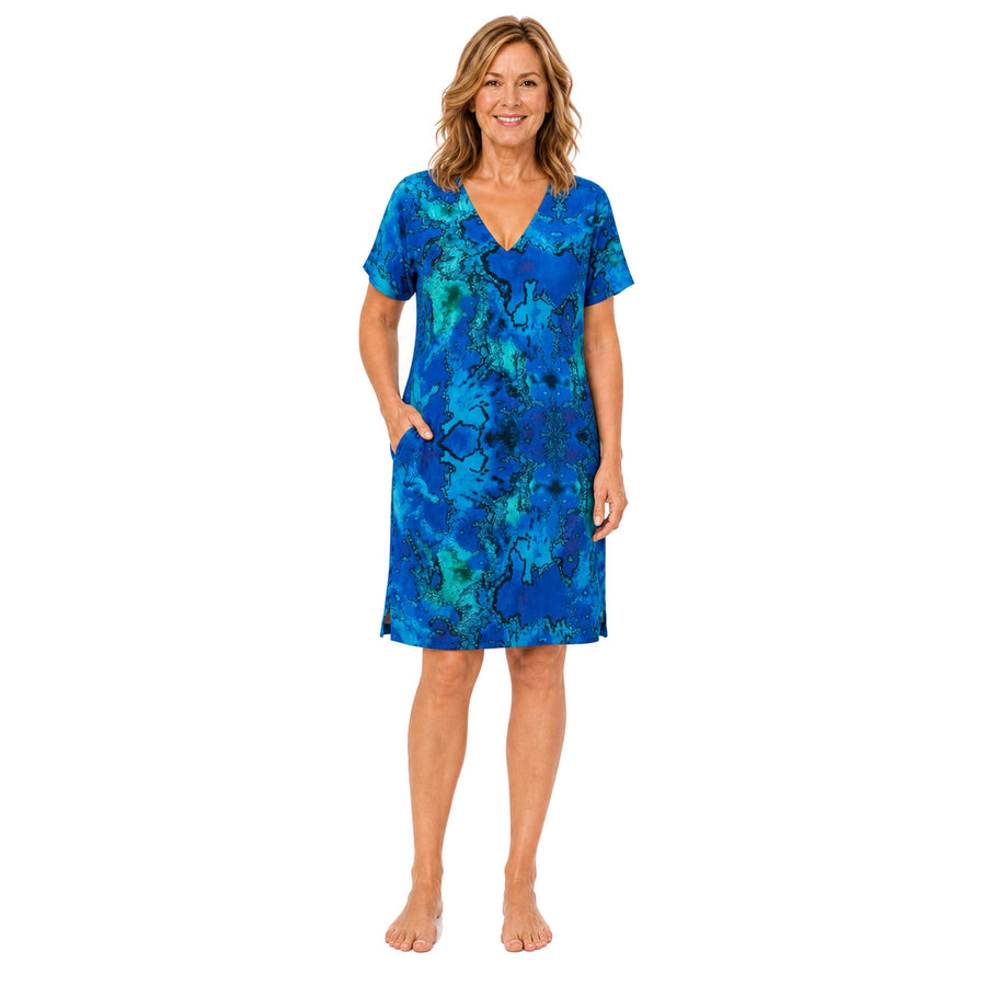 Woman wearing the Claire Powell Reef Shift Dress, front view