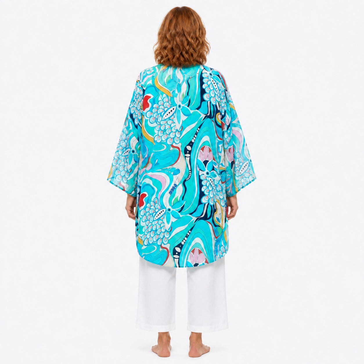 Woman wearing the Claire Powell Sakura Modal Kimono Cover-Up, back view
