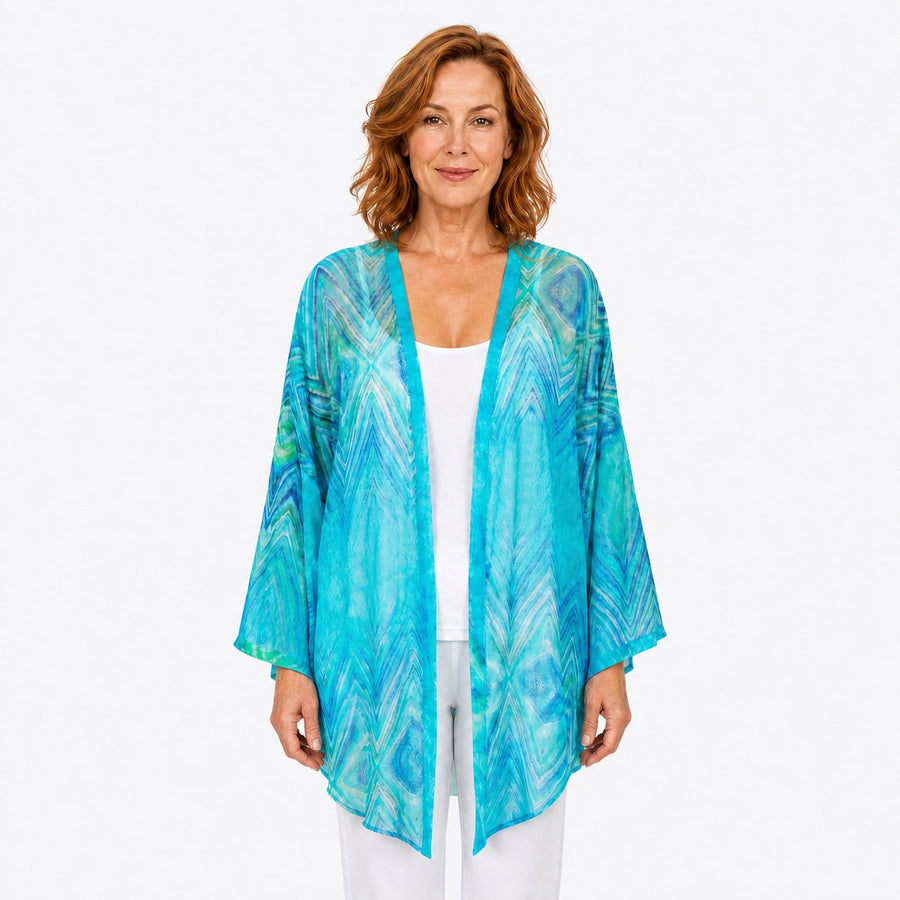 Woman wearing the Claire Powell Serenity Cotton Chiffon Kimono Cover-Up, front view