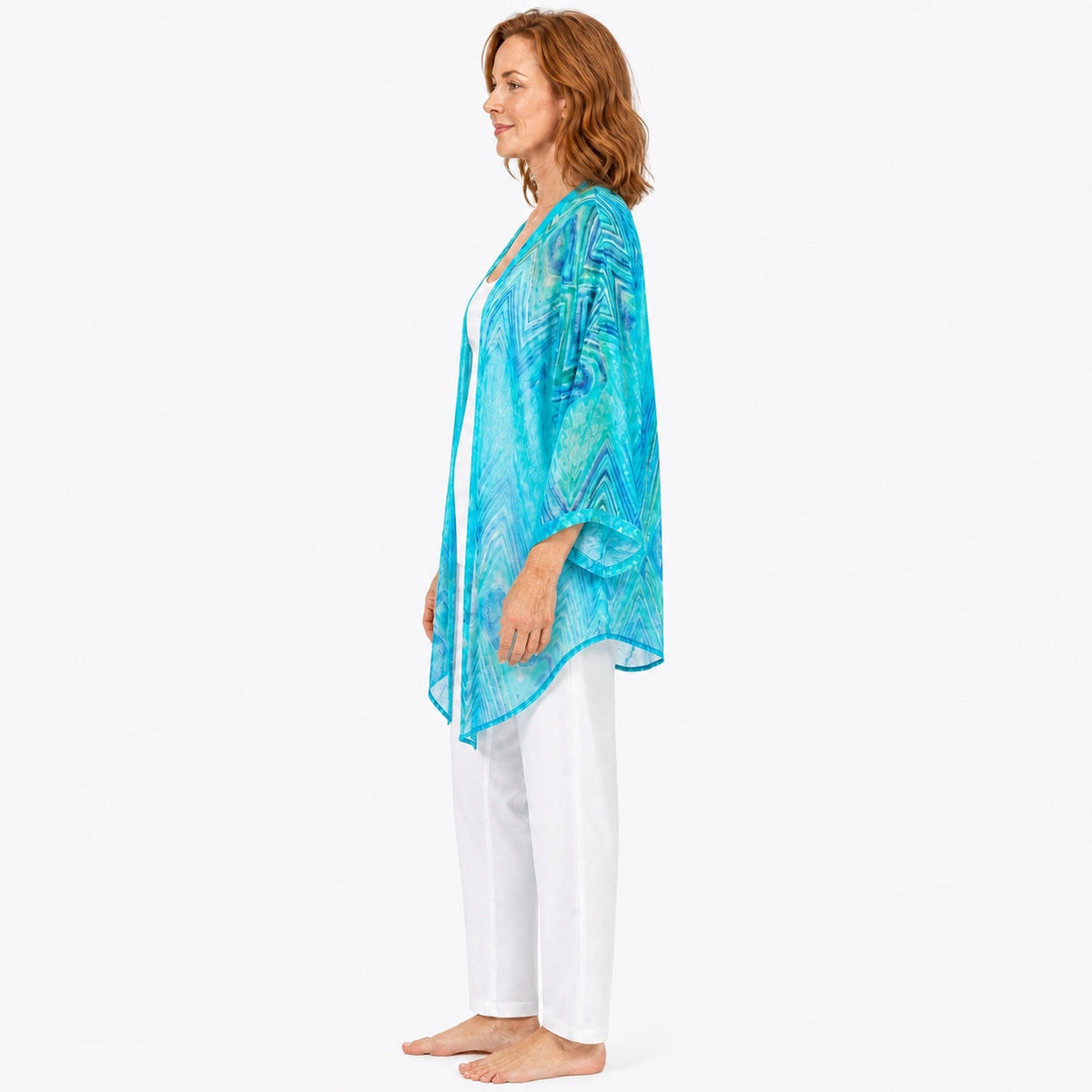 Woman wearing the Claire Powell Serenity Cotton Chiffon Kimono Cover-Up, side view
