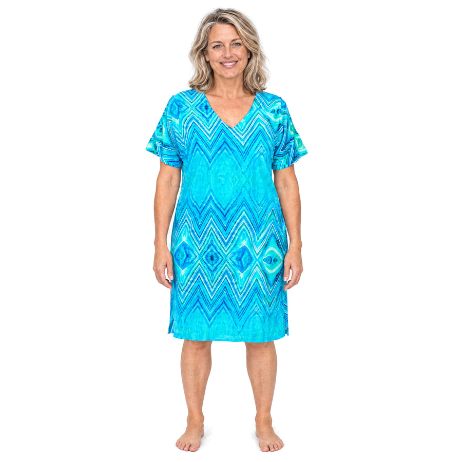 Woman wearing the Claire Powell Serenity Shift Dress, front view