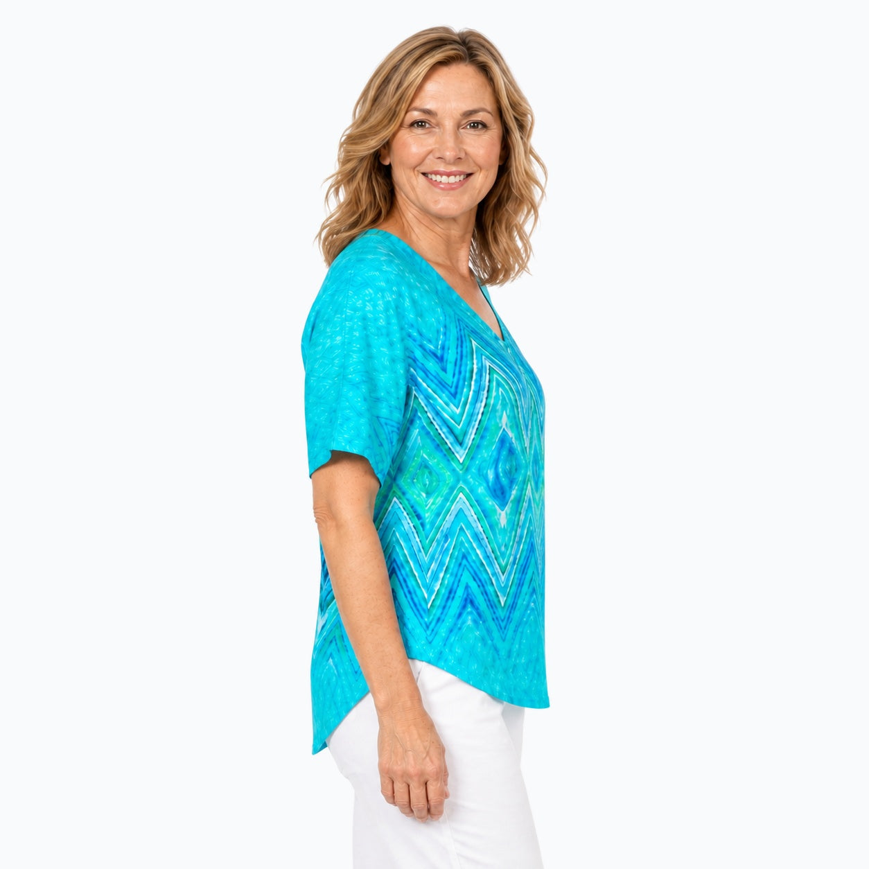 Woman wearing the Claire Powell Serenity V-Neck T-Shirt, side view
