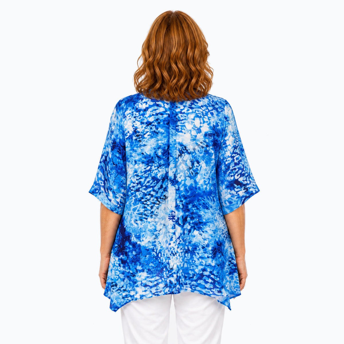 Woman wearing the Claire Powell Snowcat A-Line Tunic Shirt, back view
