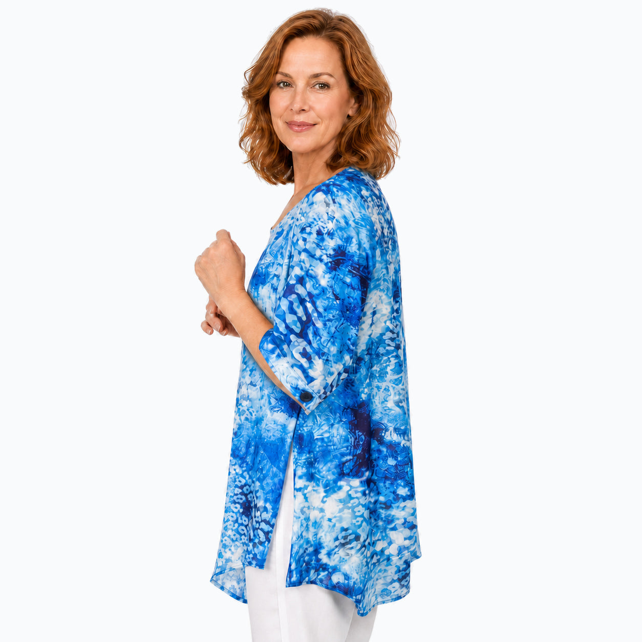 Woman wearing the Claire Powell Snowcat A-Line Tunic Shirt, side view