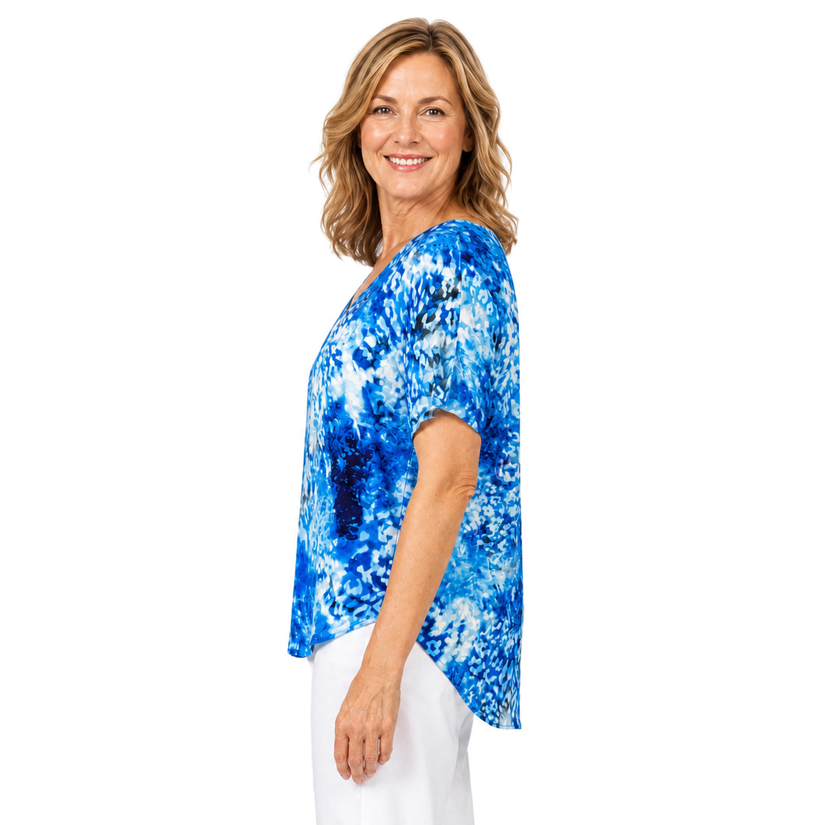 Woman wearing the Claire Powell Snowcat V-Neck T-Shirt, side view