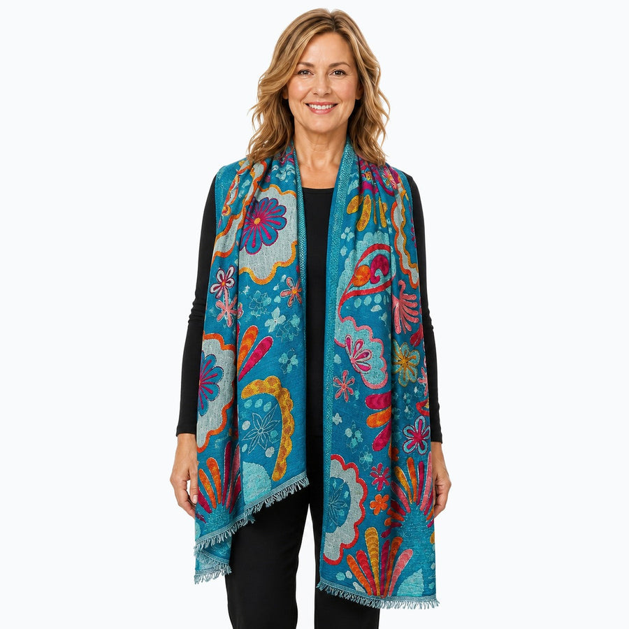 Woman wearing the Claire Powell Turquoise Wool Shawl, front view