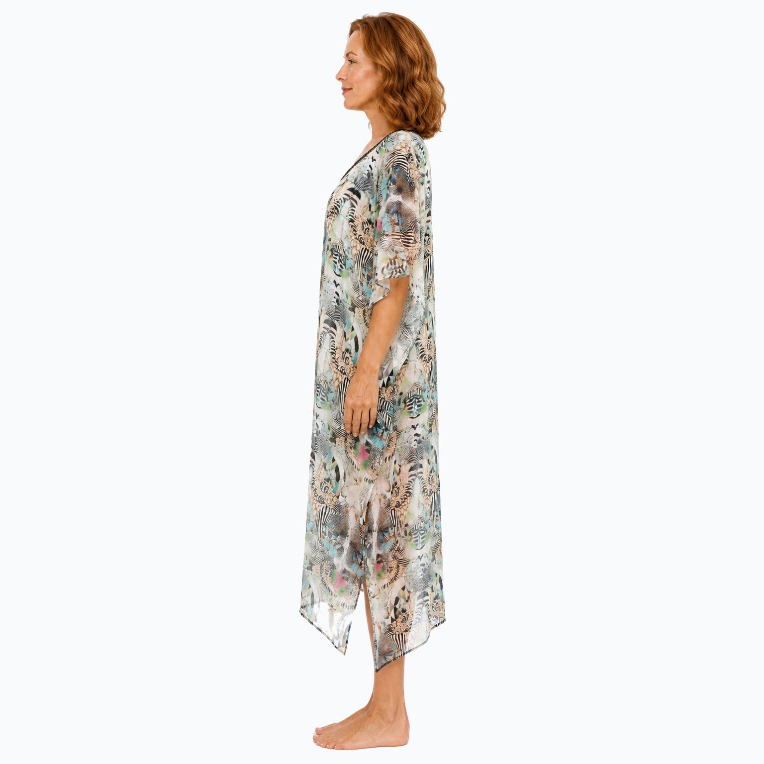 Claire Powell Zebra midi kaftan dress on a mature woman, side view