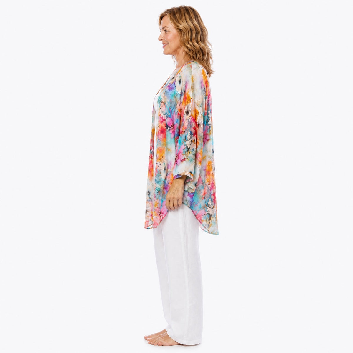 Woman wearing the Claire Powell Zen Modal Kimono Cover-Up, side view