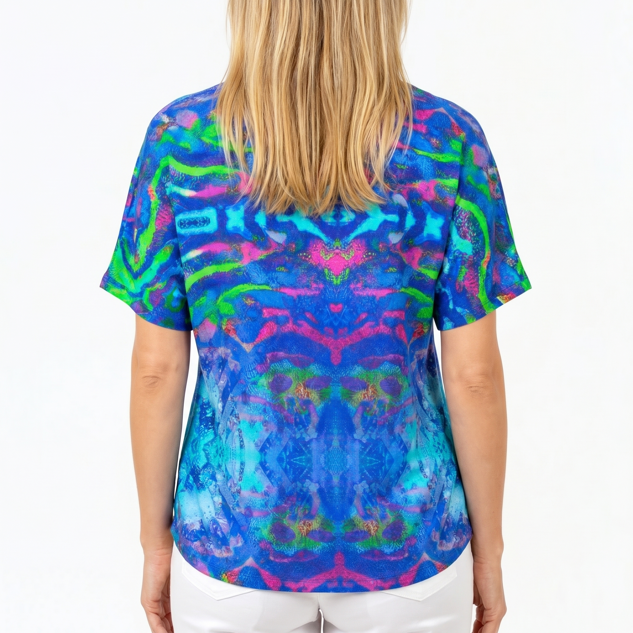Woman wearing Claire Powell V-Neck T-Shirt in Mirage print, back view, white studio background