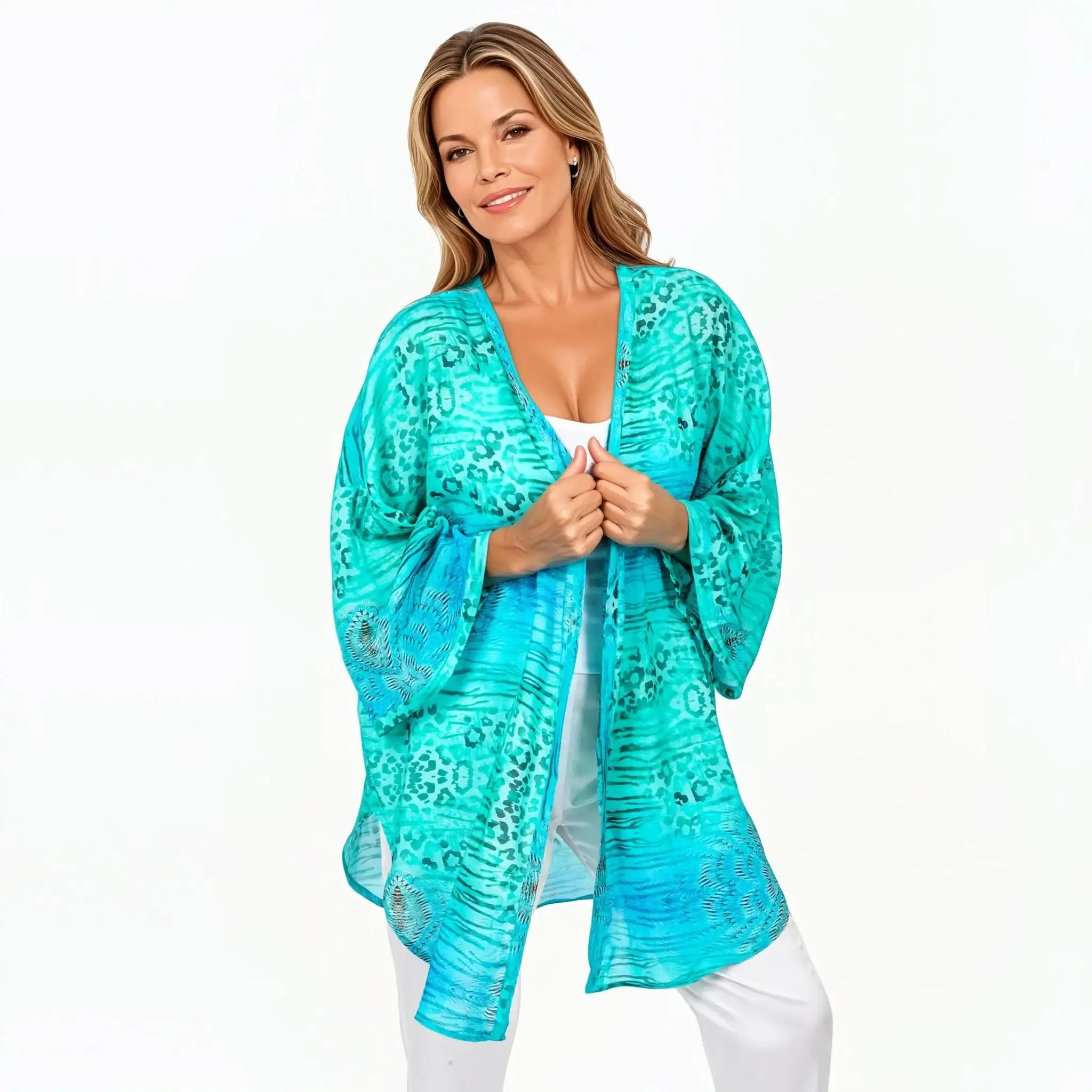 Woman wearing blue-green kimono jacket, Claire Powell eco-friendly women's clothing