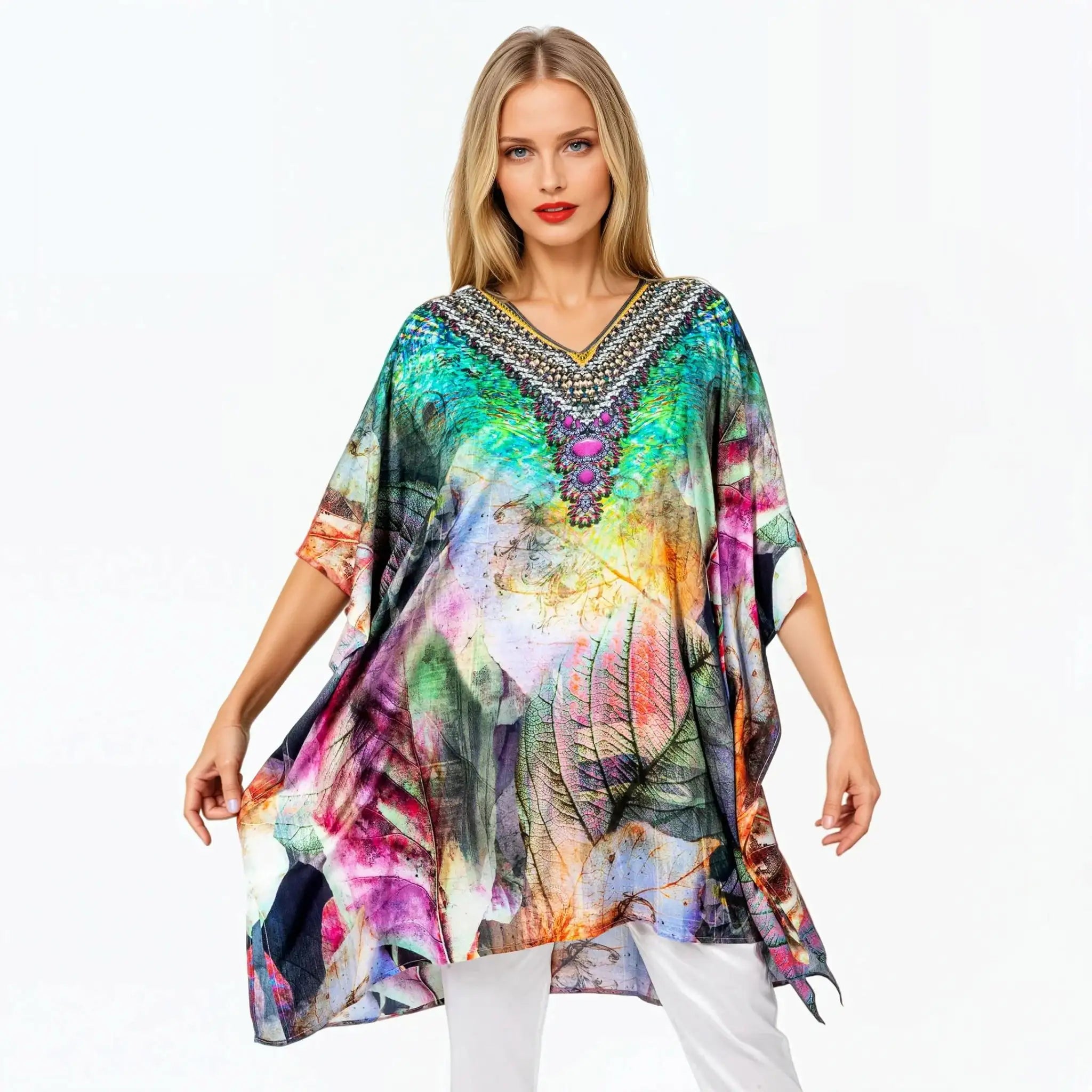 Woman wearing colorful printed mini kaftan top by Claire Powell, eco-friendly fashion style