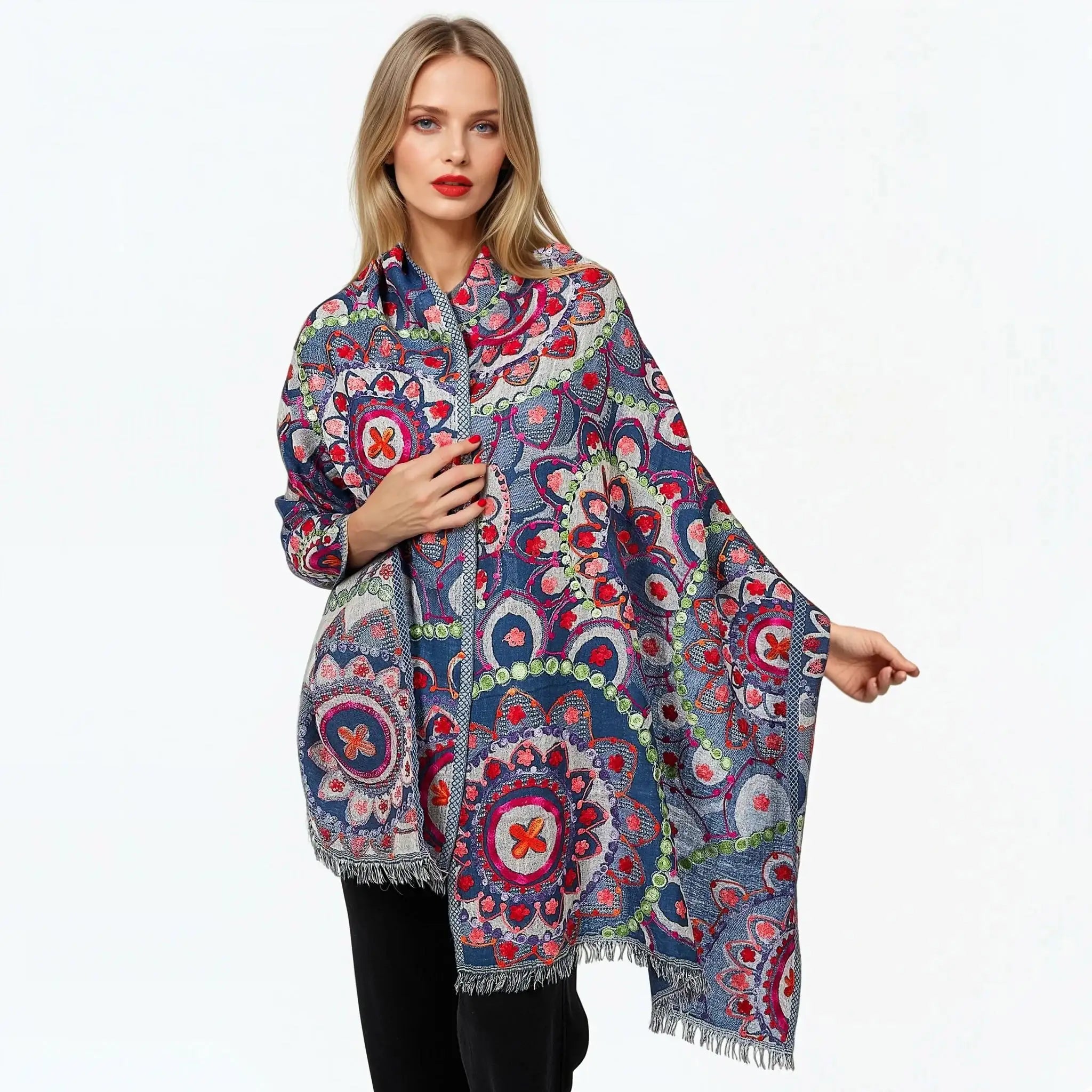 Woman wearing Claire Powell eco-friendly night blue paisley kimono with colorful floral pattern