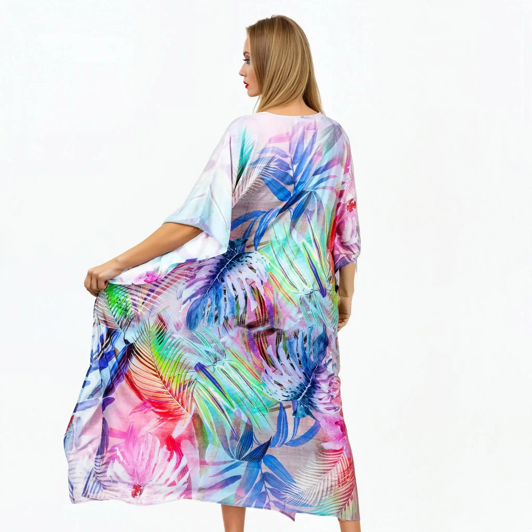 Woman wearing Claire Powell eco-friendly colorful floral kimono kaftan, back view