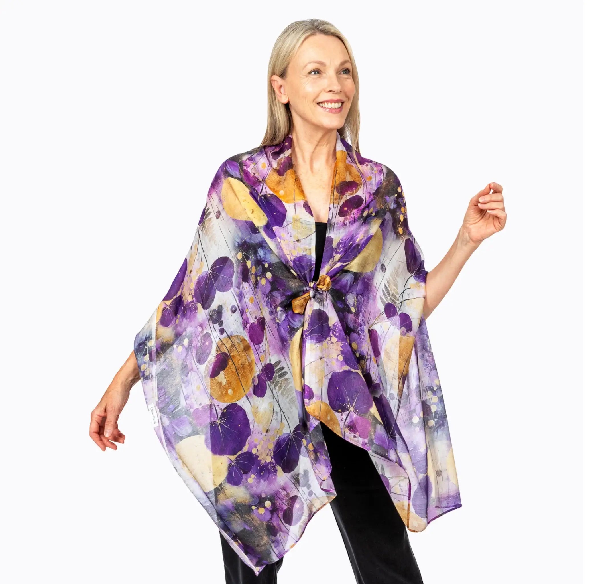 Woman wearing Claire Powell sheer scarf with purple and gold leaf print, eco-friendly fashion