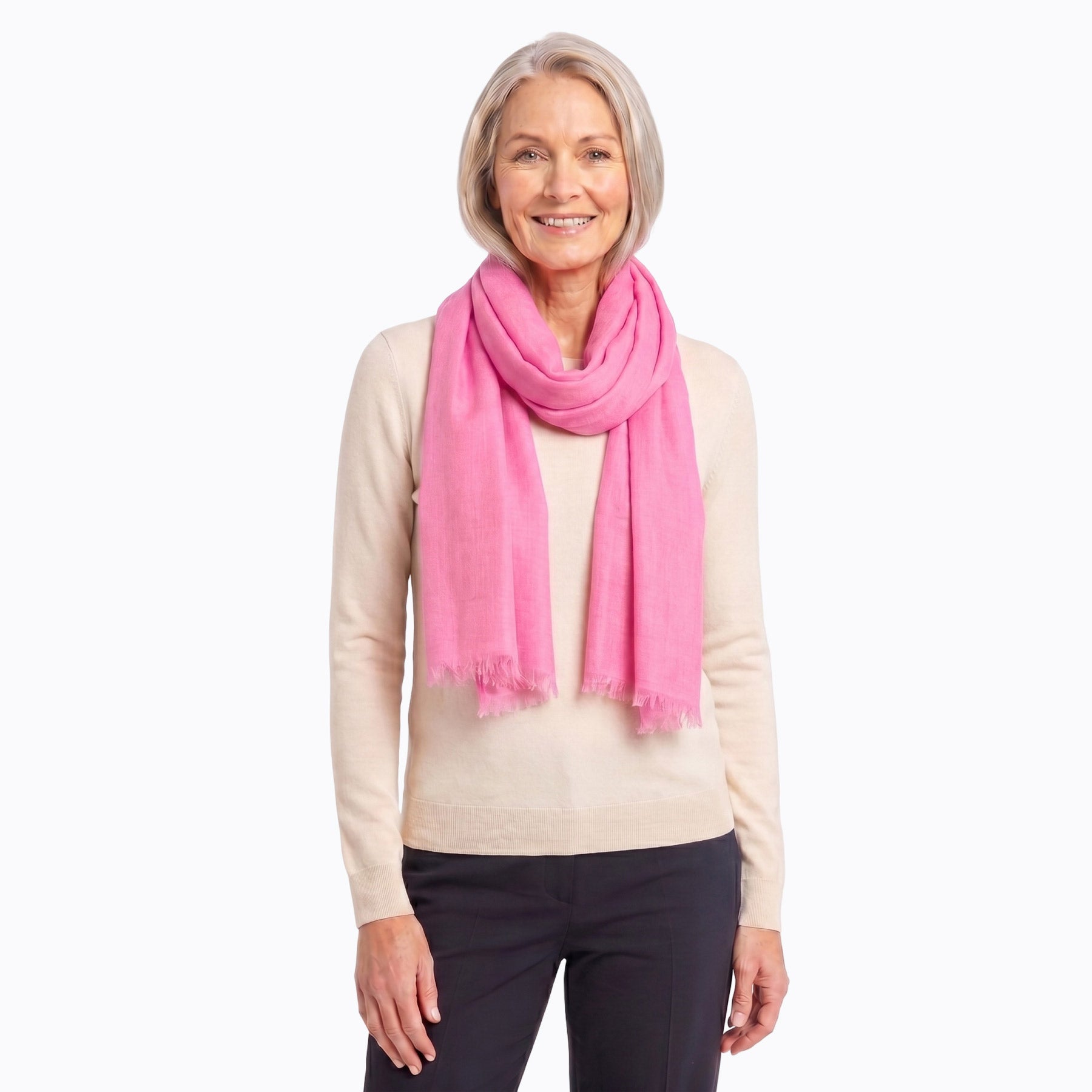 Pink wool silk scarf draped over the shoulder - Claire Powell
