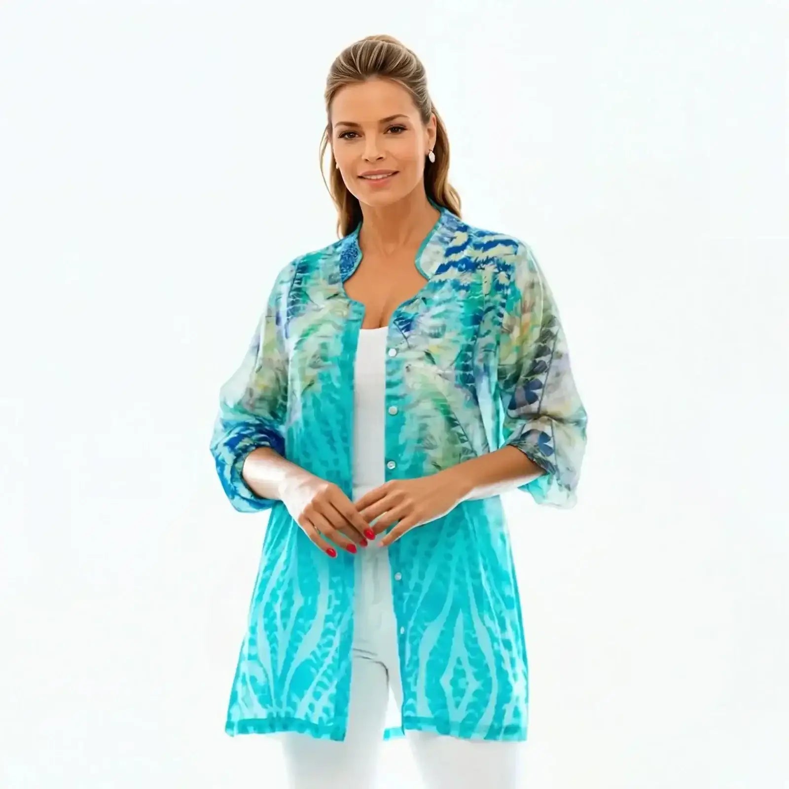 Woman wearing Claire Powell blue patterned sheer collared silk shirt over white top