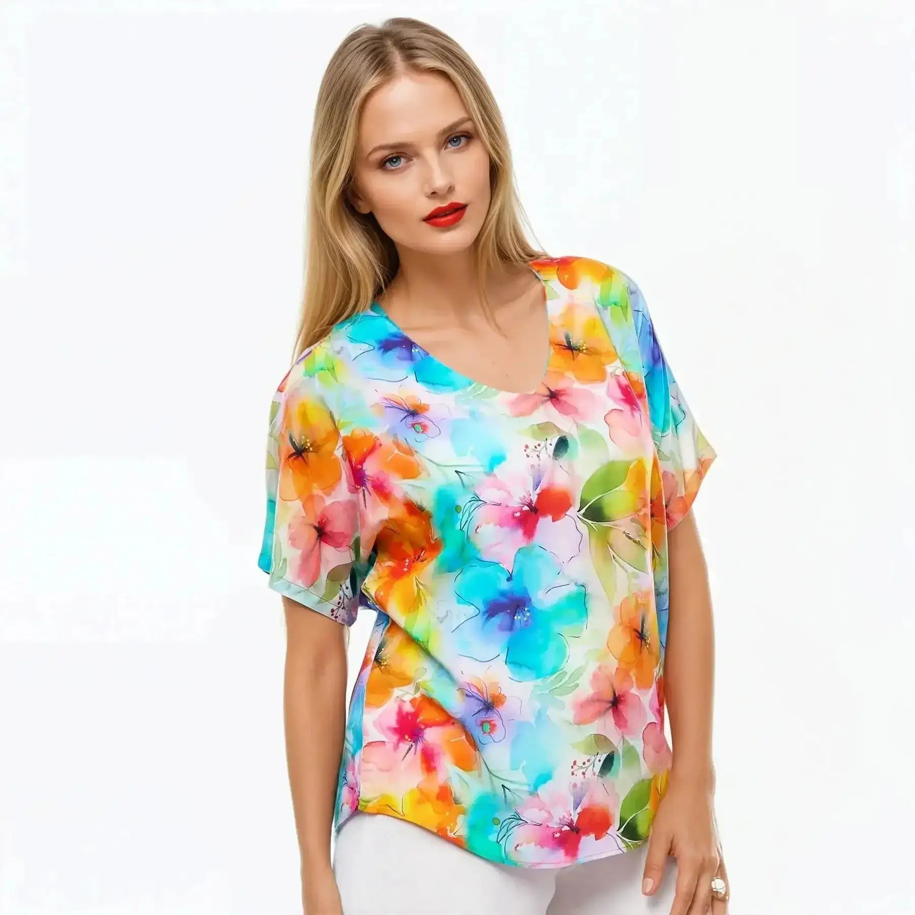 Woman wearing colorful floral V-neck t-shirt, eco-friendly fashion by Claire Powell