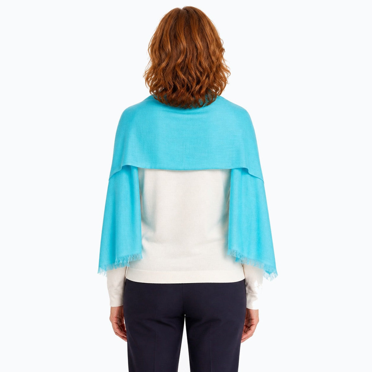 Woman wearing the Claire Powell Aqua Silk Wool Scarf, back view