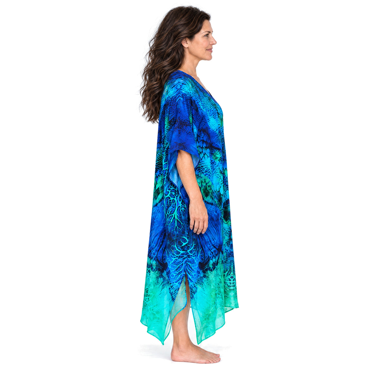 Claire Powell Aquatica midi kaftan dress on a mature woman, side view