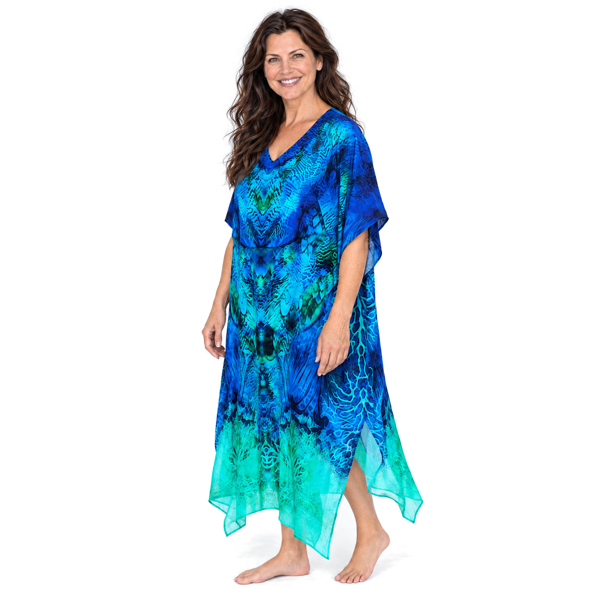 Claire Powell Aquatica midi kaftan dress on a mature woman, three-quarter view