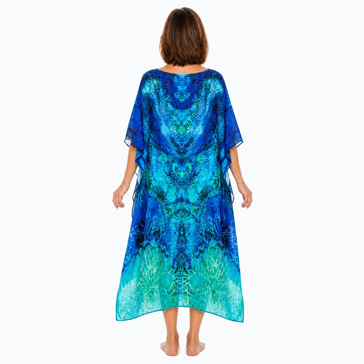 Claire Powell Aquatica midi kaftan dress on a mature woman, back view