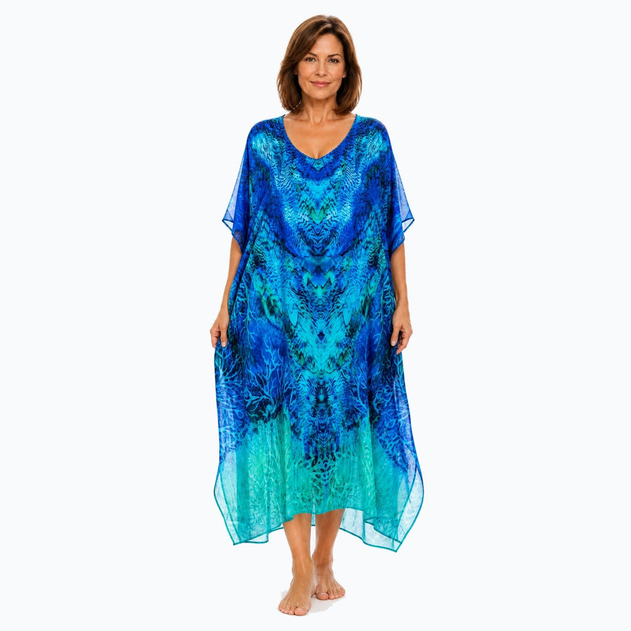 Claire Powell Aquatica midi kaftan dress on a mature woman, front view