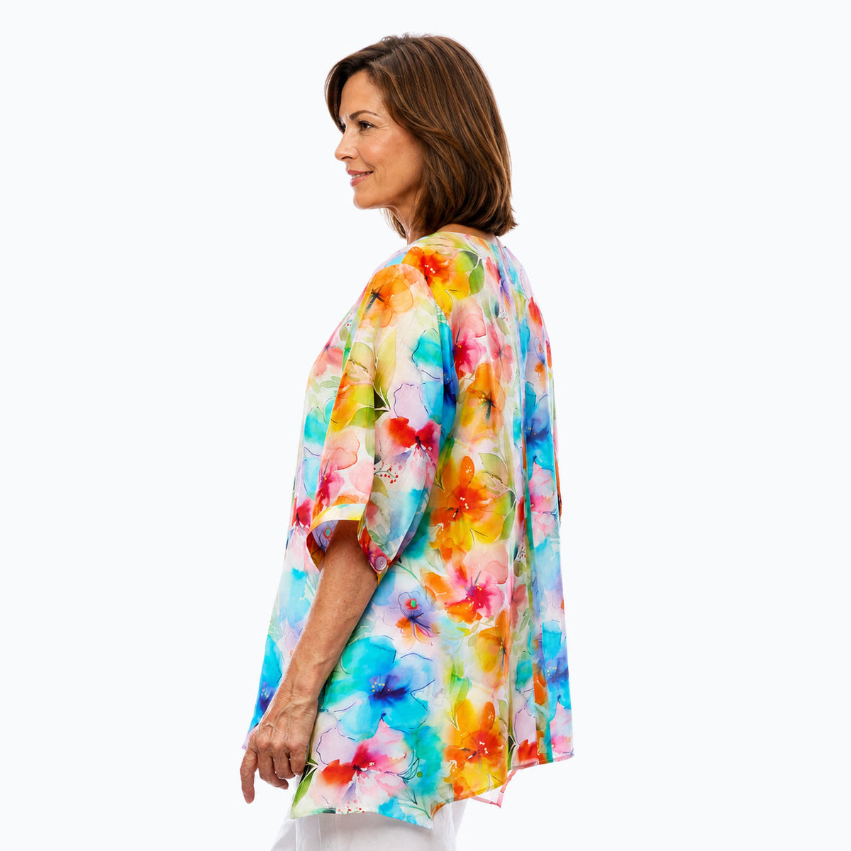 Woman wearing the Claire Powell Blushing A-Line Tunic Shirt, side view