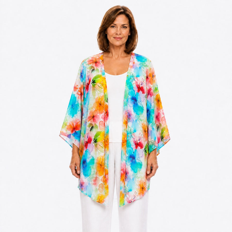 Woman wearing the Claire Powell Blushing Modal Kimono Cover-Up, front view