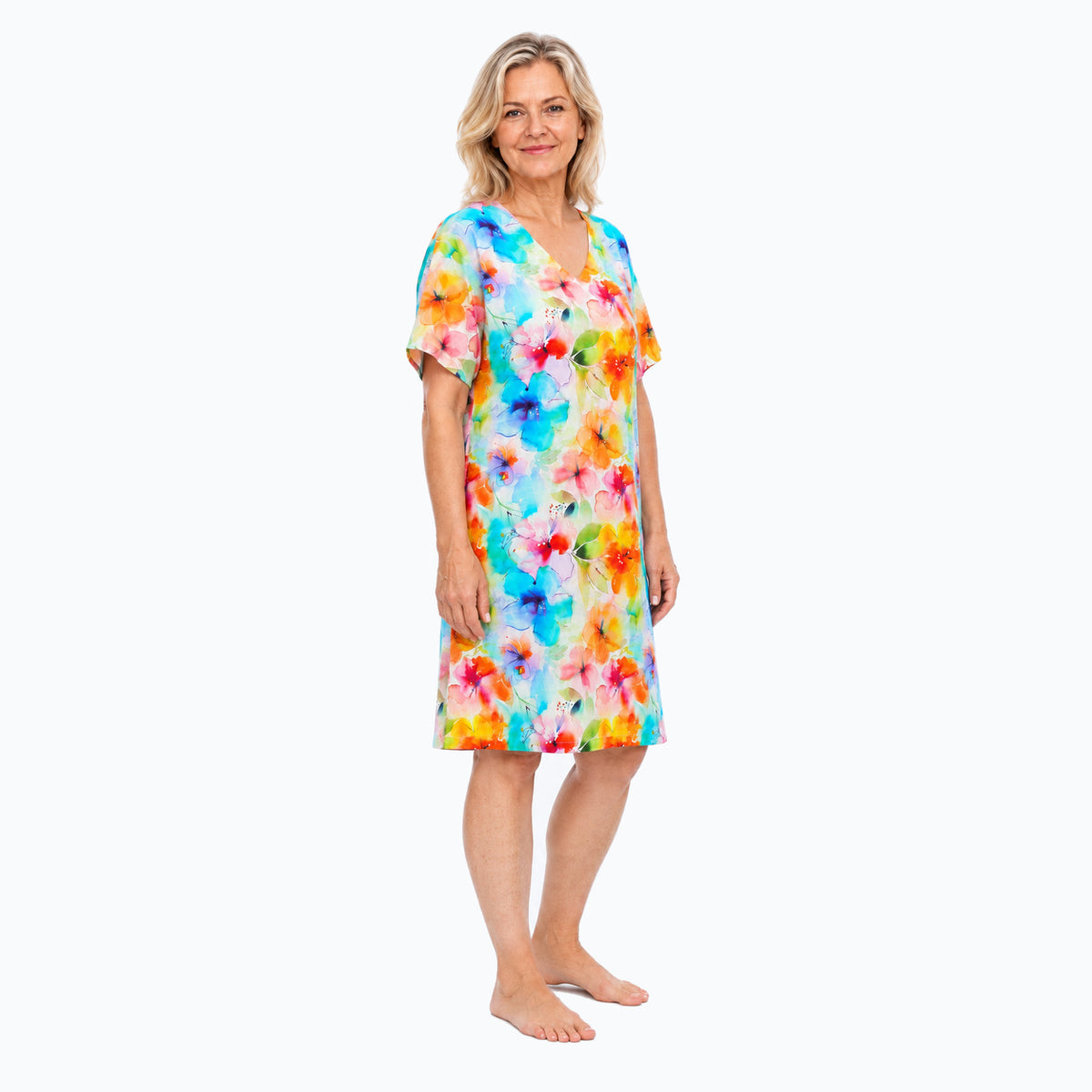 Three-quarter view of Model B wearing Claire Powell Blushing floral V-neck shift dress