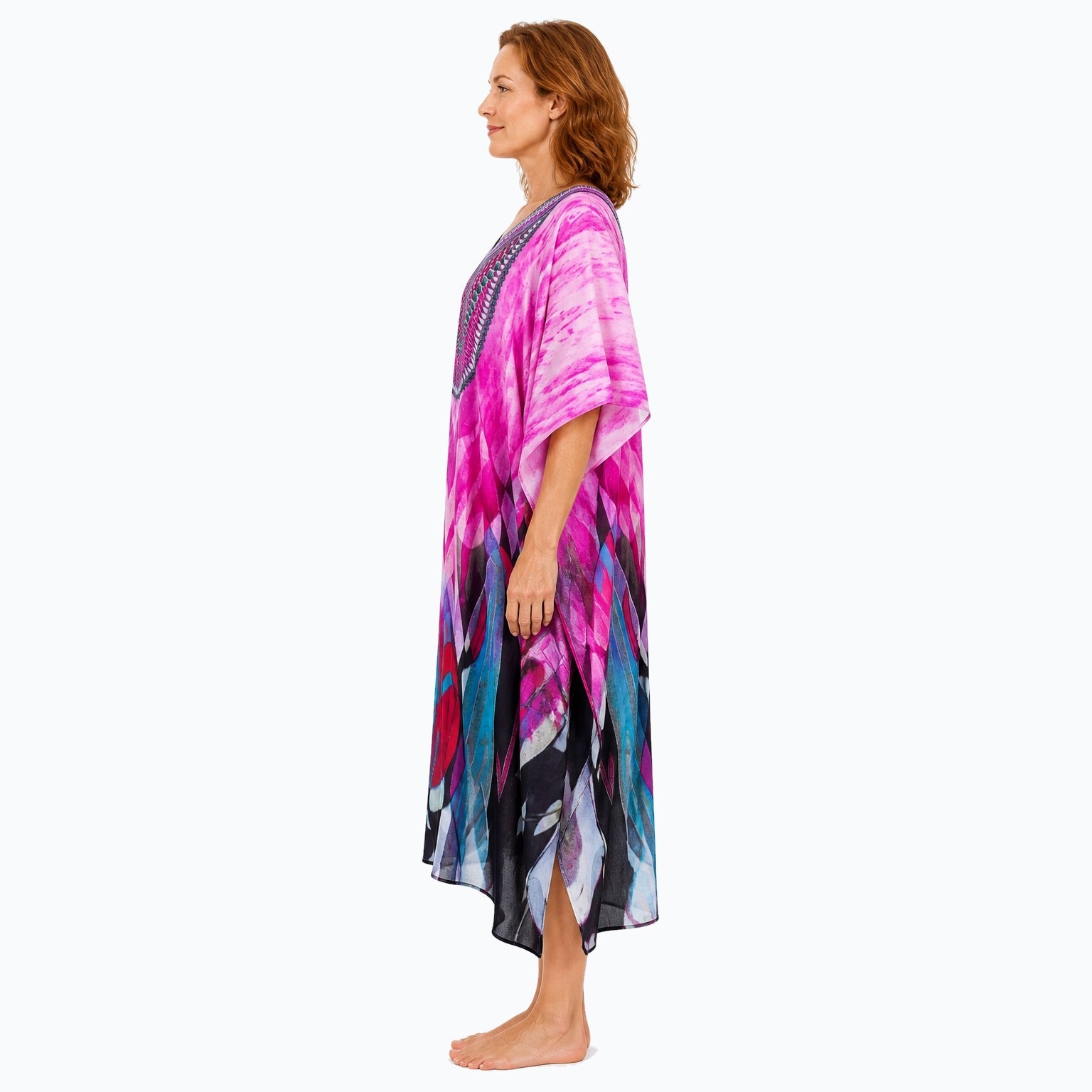 Claire Powell Brazen midi kaftan dress on a mature woman, side view