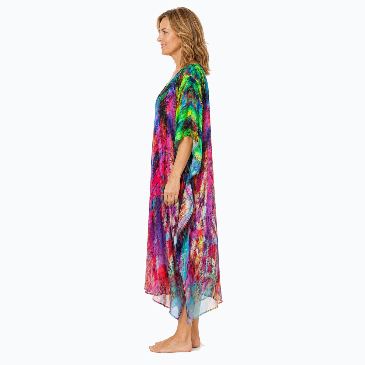 Claire Powell Carnival midi kaftan dress on a mature woman, side view
