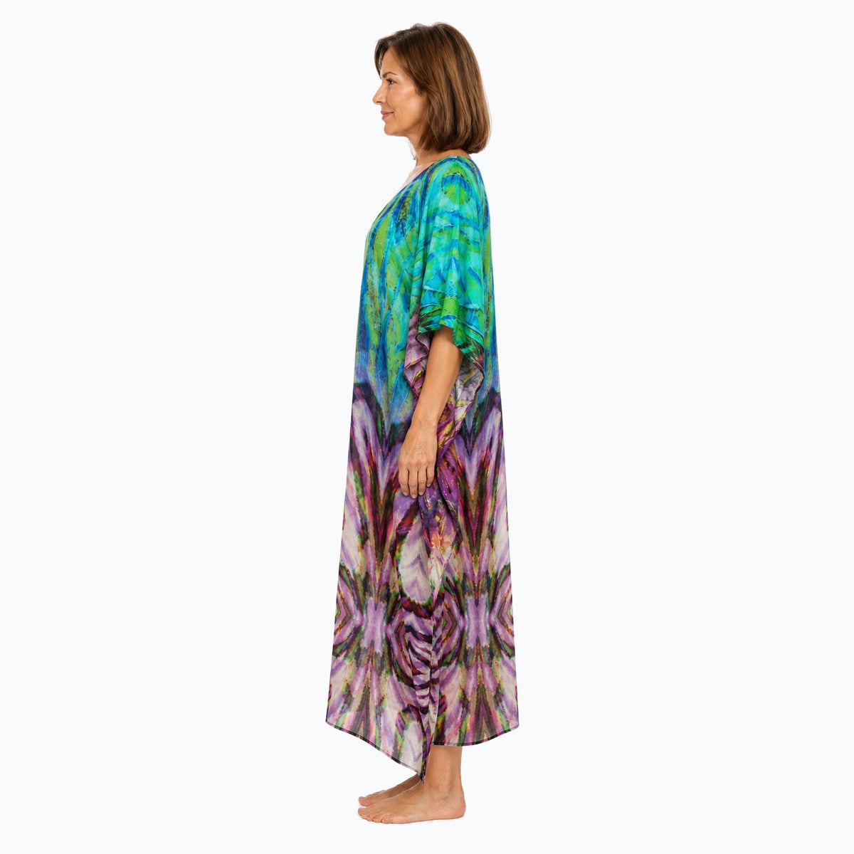 Claire Powell Cascade midi kaftan dress on a mature woman, side view